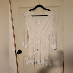 White/cream colored V neck dress